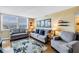 Cozy living room with stylish furnishings and a view of the bay at 6265 Sun Blvd # 605, St Petersburg, FL 33715