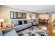 Spacious condo with living and dining area, boasting hardwood floors and tasteful decor at 6265 Sun Blvd # 605, St Petersburg, FL 33715