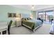 Inviting main bedroom with balcony, natural light, and calming decor at 6265 Sun Blvd # 605, St Petersburg, FL 33715