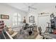 Bright bonus room with drum set, keyboard, and ample space for creative pursuits at 703 Monte Cristo Blvd, Tierra Verde, FL 33715