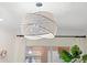 Close-up of a chandelier providing a captivating view of the indoor lighting at 703 Monte Cristo Blvd, Tierra Verde, FL 33715