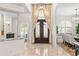 View of the foyer showcasing the front door and an open floorplan at 703 Monte Cristo Blvd, Tierra Verde, FL 33715
