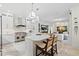 Modern kitchen features a large island with seating and stainless steel appliances at 703 Monte Cristo Blvd, Tierra Verde, FL 33715