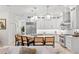 A bright, open-concept kitchen and island with seating make it ideal for entertaining at 703 Monte Cristo Blvd, Tierra Verde, FL 33715