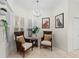 Cozy sitting area with shuttered windows, providing a tranquil spot for relaxation and reading at 703 Monte Cristo Blvd, Tierra Verde, FL 33715