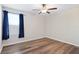 Bedroom with ample natural light and wood floors at 7170 Samuel Ivy Dr, Tampa, FL 33619