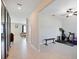 Bonus room with tile floors and workout equipment at 7170 Samuel Ivy Dr, Tampa, FL 33619
