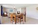 Open concept dining area featuring a natural light and tile flooring at 7170 Samuel Ivy Dr, Tampa, FL 33619