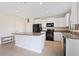Clean kitchen featuring white cabinets, granite countertops, and stainless steel appliances at 7170 Samuel Ivy Dr, Tampa, FL 33619