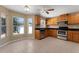 Sunny breakfast nook in kitchen, stainless appliances, tiled floors, and plenty of cabinet storage at 7222 N Amos Ave, Tampa, FL 33614