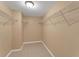 Walk-in closet with ample shelving, great for organization at 7222 N Amos Ave, Tampa, FL 33614