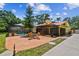 Screened-in pool with patio, outdoor seating and mature trees surrounding the property at 7507 Beasley Rd, Tampa, FL 33615