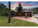 Lush backyard with a screened pool and outdoor patio, perfect for entertaining or relaxing at 7507 Beasley Rd, Tampa, FL 33615