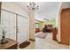 Inviting foyer with tiled flooring and a view into a home office at 7507 Beasley Rd, Tampa, FL 33615