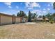 Spacious outbuilding with large garage doors and adjacent to main house at 7507 Beasley Rd, Tampa, FL 33615