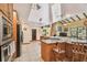 Well-appointed kitchen featuring stainless steel appliances, an island cooktop, and ample counter space at 7507 Beasley Rd, Tampa, FL 33615