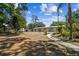 Large outbuilding with multiple garage doors on a large lot at 7507 Beasley Rd, Tampa, FL 33615