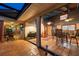 Enclosed patio featuring tile flooring, multiple fans, and easy access to the pool at 7507 Beasley Rd, Tampa, FL 33615