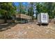 Outdoor storage area with shelters and trailer at 7507 Beasley Rd, Tampa, FL 33615
