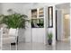 Built-in bar area with mirrored backing is perfect for entertaining guests at 7520 Sunshine Skyway S Ln # 109, St Petersburg, FL 33711