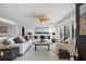 Bright and airy living room with elegant furnishings, tile floors, and lots of natural light at 7520 Sunshine Skyway S Ln # 109, St Petersburg, FL 33711