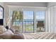 Stunning water view from bedroom with shutters, providing both privacy and light control at 7520 Sunshine Skyway S Ln # 109, St Petersburg, FL 33711