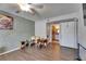 Bedroom with ceiling fan, textured accent wall, door to bathroom at 9481 Highland Oak Dr # 1511, Tampa, FL 33647