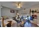 Bedroom with hardwood floors, ceiling fan, window, and decor at 9481 Highland Oak Dr # 1511, Tampa, FL 33647
