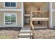 Condo entrance with steps and walkway, offering easy access to this well-maintained property at 9481 Highland Oak Dr # 1511, Tampa, FL 33647