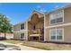 Condo with neutral paint, trimmed windows, and well-kept landscaping for low-maintenance living at 9481 Highland Oak Dr # 1511, Tampa, FL 33647