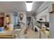 Functional kitchen featuring granite countertops and all-white appliances at 9481 Highland Oak Dr # 1511, Tampa, FL 33647