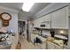 Efficient kitchen with white appliances and convenient pantry storage at 9481 Highland Oak Dr # 1511, Tampa, FL 33647