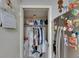 Conveniently located laundry closet with washer, dryer and storage shelves at 9481 Highland Oak Dr # 1511, Tampa, FL 33647