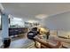 Open living room with bar seating, blending comfort and functionality seamlessly at 9481 Highland Oak Dr # 1511, Tampa, FL 33647