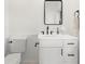 Stylish bathroom featuring a vanity with a sleek mirror at 9542 Wallien Dr, Brooksville, FL 34601