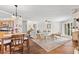 Spacious living area featuring an open layout, hardwood floors, and stylish decor at 9542 Wallien Dr, Brooksville, FL 34601