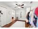 Functional walk-in closet with organized storage and a full-length mirror at 9542 Wallien Dr, Brooksville, FL 34601