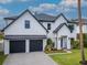 Stunning two-story home featuring a two-car garage and well-manicured landscaping at 4111 W Swann Ave, Tampa, FL 33609