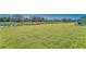 Expansive backyard with pond views, offering a serene and private outdoor space, perfect for relaxation and enjoying nature at 10245 Shady Preserve Dr, Riverview, FL 33578