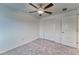 Bedroom with a fan, closet, and white walls at 10245 Shady Preserve Dr, Riverview, FL 33578