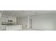 Open-concept kitchen and living room with tile flooring and lots of natural light at 10245 Shady Preserve Dr, Riverview, FL 33578