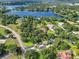 Beautiful lakefront homes surrounded by lush greenery in a quiet, residential neighborhood at 10504 Echo Lake Dr, Odessa, FL 33556