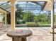 Outdoor living area showcasing a pool, spa, and fire pit, perfect for entertaining at 10504 Echo Lake Dr, Odessa, FL 33556