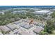 Aerial view of townhome community, showcasing well-maintained landscaping and convenient parking at 10907 Golden Acorn Ave, Tampa, FL 33610