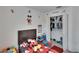 Playful ' bedroom featuring fun decor, ample storage, and a cozy sleeping area at 10907 Golden Acorn Ave, Tampa, FL 33610