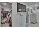 Bedroom closet with ample storage space, built-in shelving and TV, ideal for organization at 10907 Golden Acorn Ave, Tampa, FL 33610