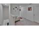 Upstairs hallway featuring chair and decor at 10907 Golden Acorn Ave, Tampa, FL 33610