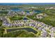 Aerial view of neighborhood highlighting beautiful landscaping, community lakes and luxurious homes at 11510 Quiet Forest Dr, Tampa, FL 33635