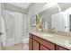 Bathroom with a single granite countertop, shower and bath-tub combination at 11510 Quiet Forest Dr, Tampa, FL 33635