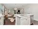 Open-concept kitchen with a view of the living space featuring a stylish island at 11510 Quiet Forest Dr, Tampa, FL 33635
